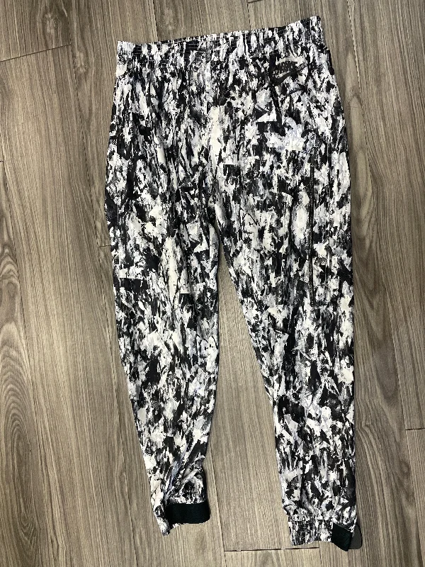 Stretchy skinny pants for figure-hugging appeal -Athletic Pants By Nike In Black & White, Size: M