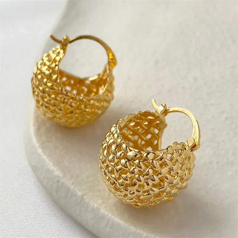 Hoop earrings with leather accents for a sleek and bold combination-Street style hoop earrings-Design Gold Color Plated Braided Hollow Circle Ball Hoop Women Ear Buckles Wholesale Simple Earring