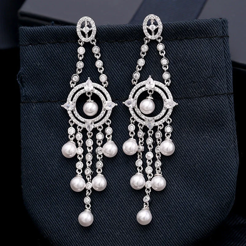 Best hoop earrings with custom engravings for a personalized and meaningful gift-Hoop earrings with tribal design-Pearl earrings long tassel heavy zircon earrings versatile for banquets.