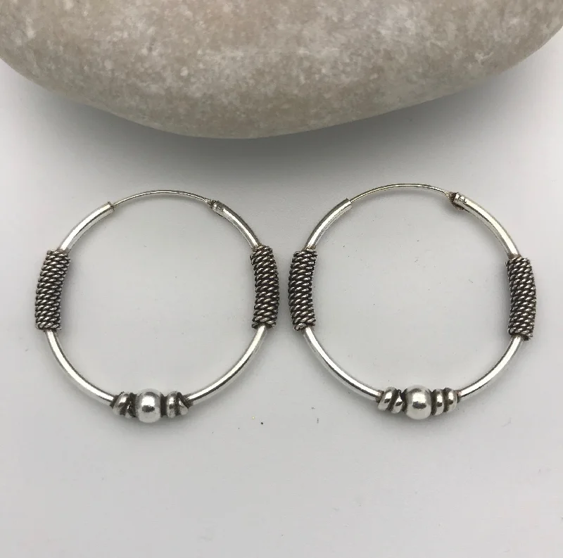 Hoop earrings with diamond-cut surfaces for added sparkle and shine-Hoop earrings with dangling pendants-Sterling Silver Tribal Karen Hoop 5 Earrings