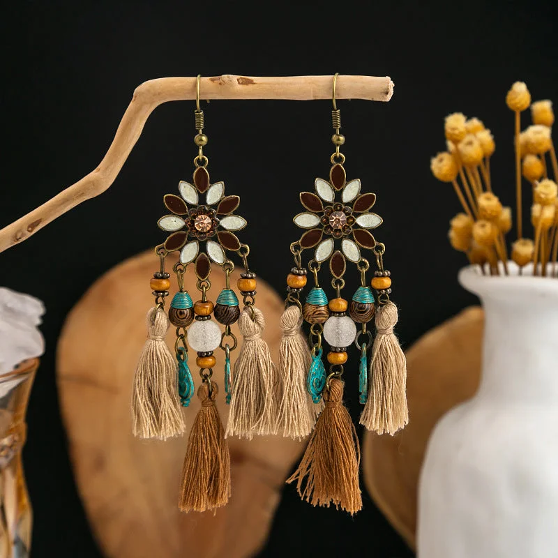 Best hoop earrings with asymmetrical designs for a fashion-forward, avant-garde look-Clip-on hoop earrings-Wholesale Boho Tassel Flowers Alloy Earrings